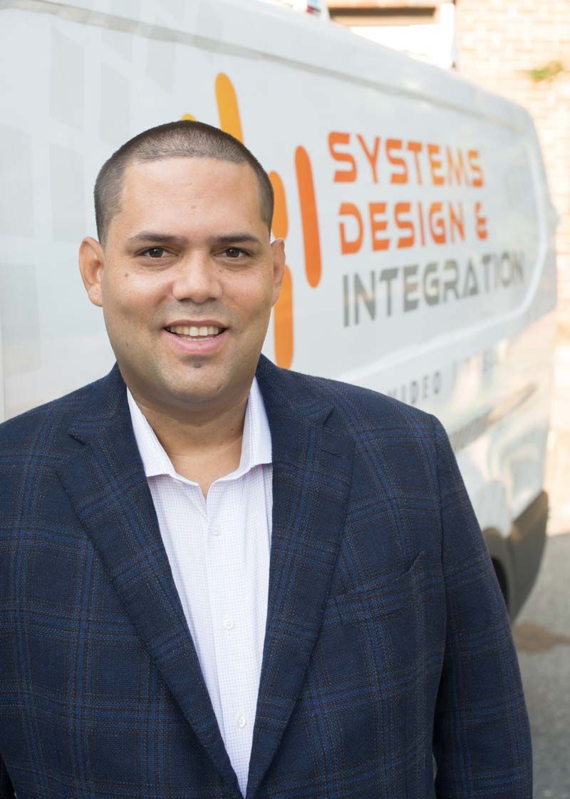 headshot of man, employee at system design and integration in boston