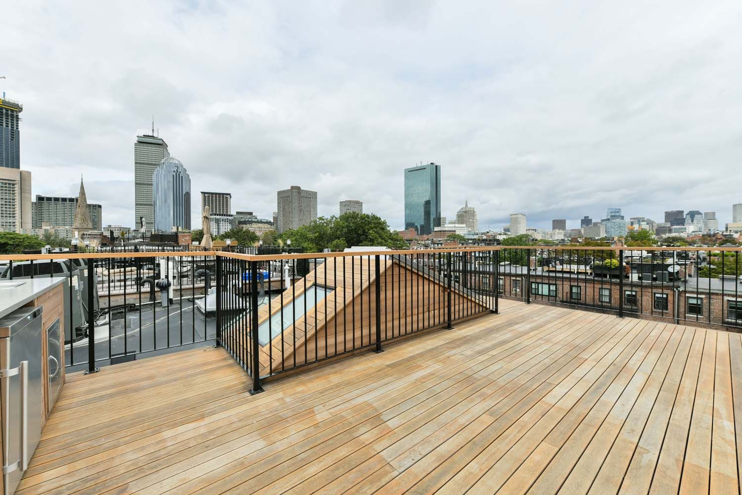 rooftop porch with wooden floors