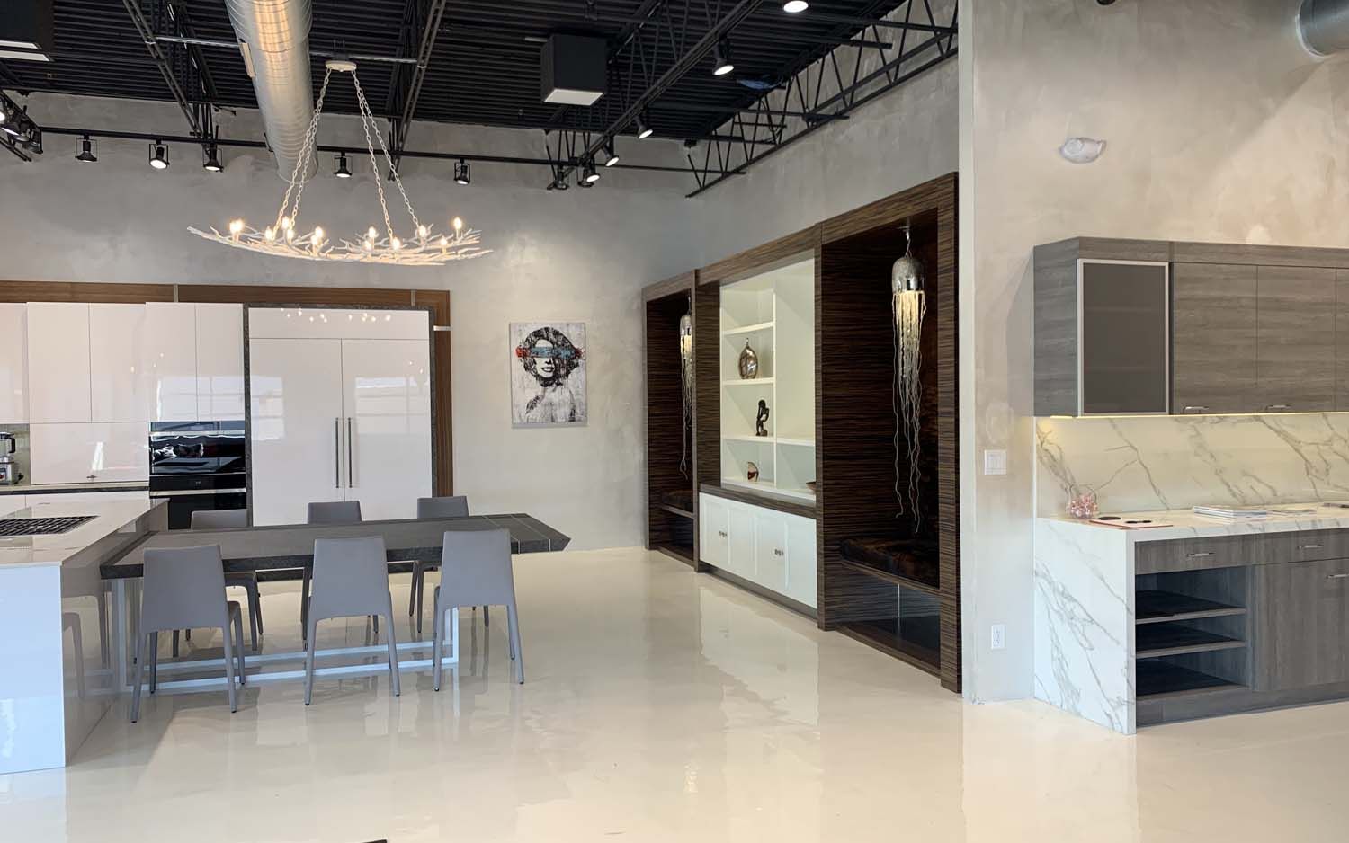 room with white floors and concrete walls 